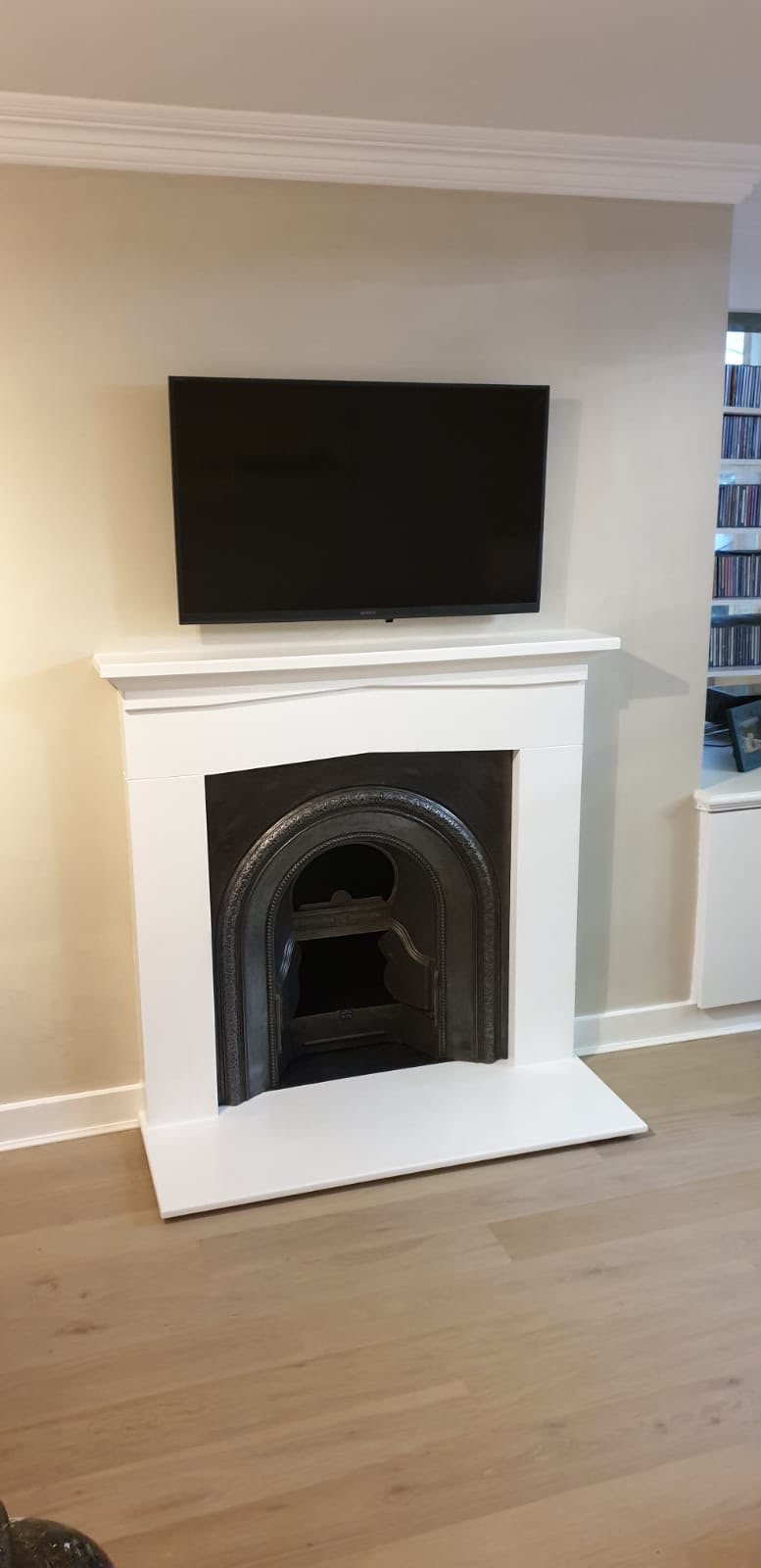 Restored fireplace with cast iron insert