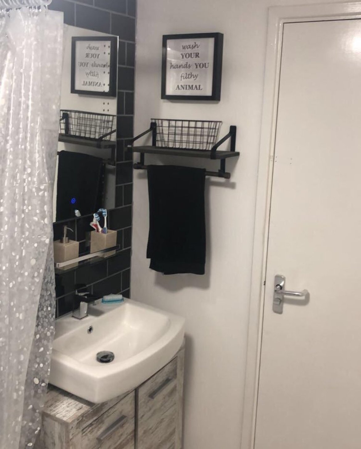 Finished small bathroom with sink and shower