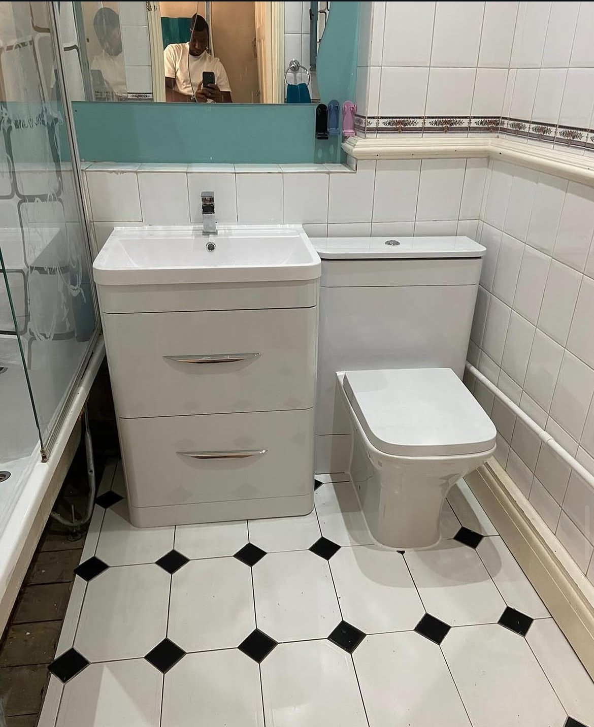 Bathroom vanity unit and toilet installation